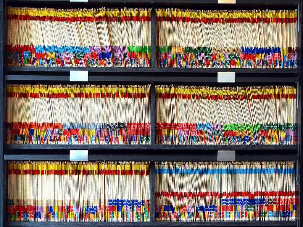 Colorful shelves of paperrecords at a dental clinic Credit: Tom Magliery License: CC BY-NC-SA 2.0